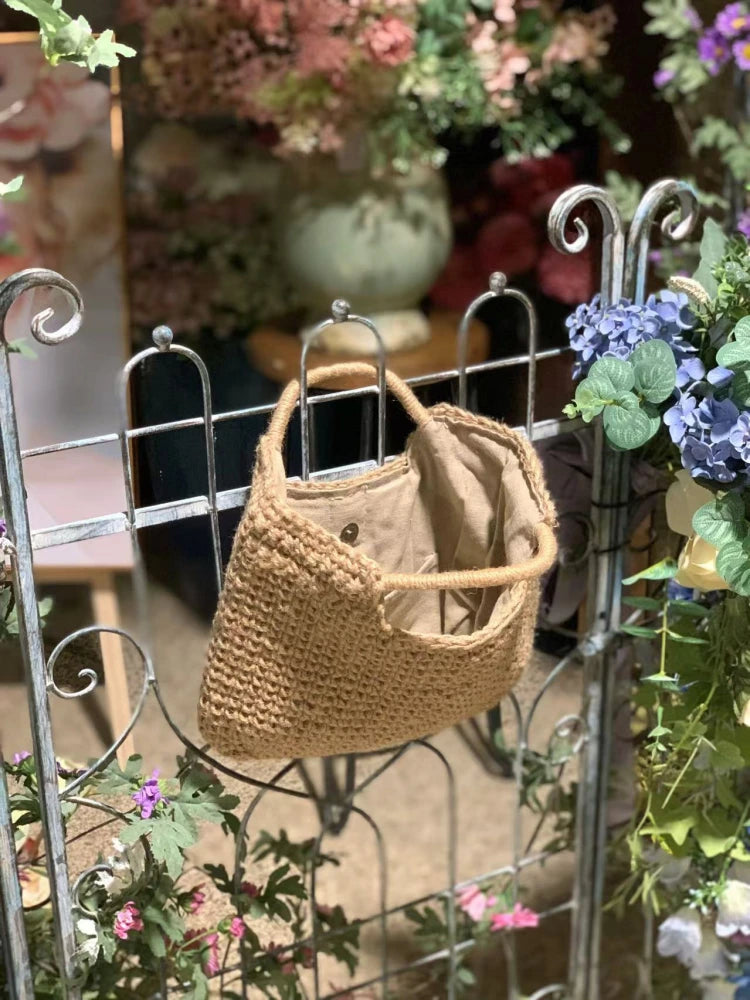 Top handle Hemp bag with 2 handwoven handles, cotton lining and a magnetic button