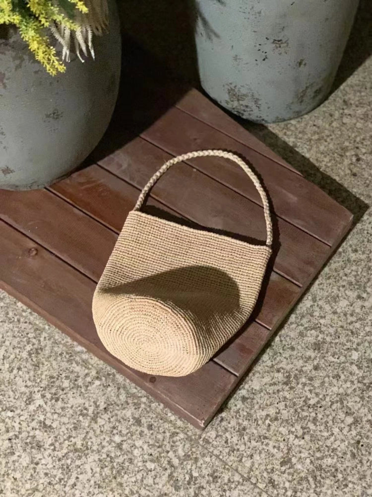 Round bottom bag with top handle