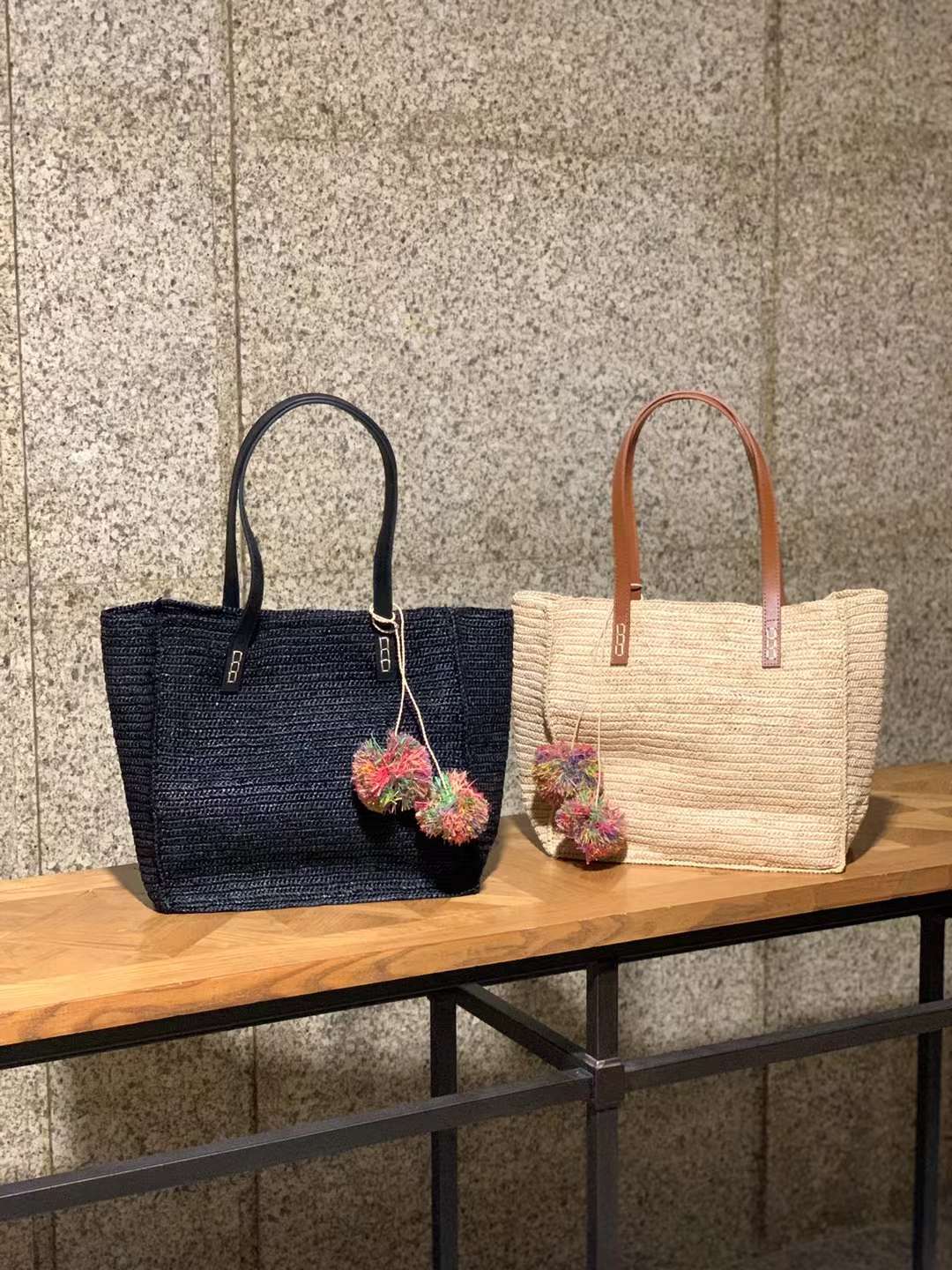 Black straw tote and Beige Straw Tote With Leather Strap, rectangular shape, flat bottom