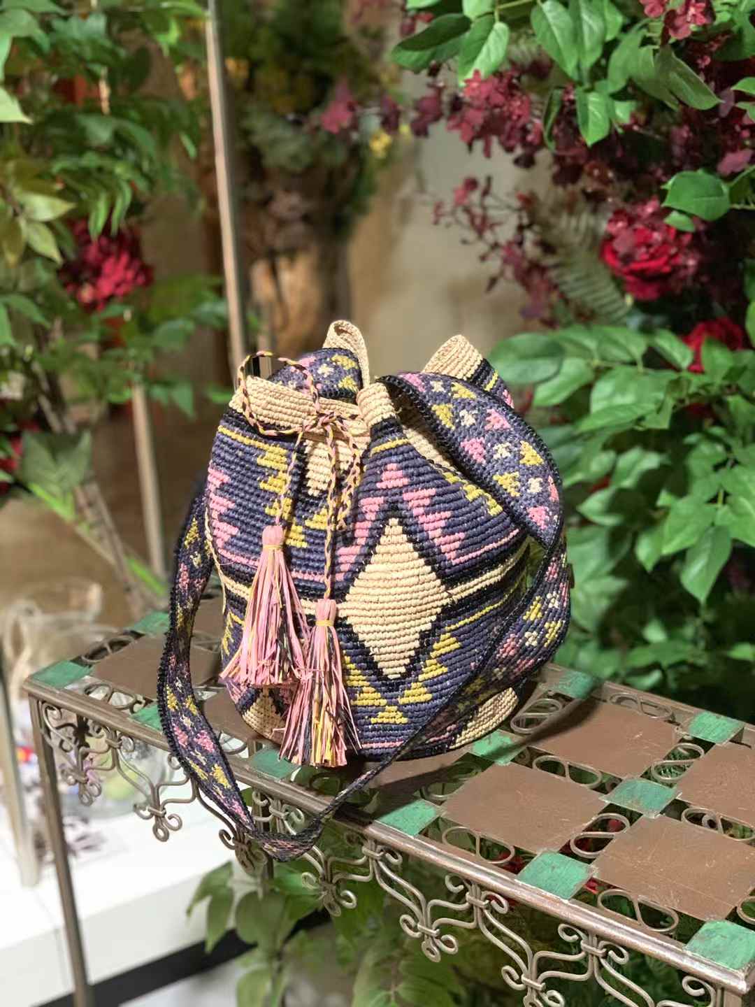 raffia bucket bag in geometric pattern