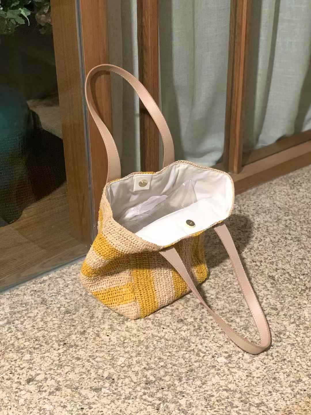yellow stripes pattern raffia bag with leather straps