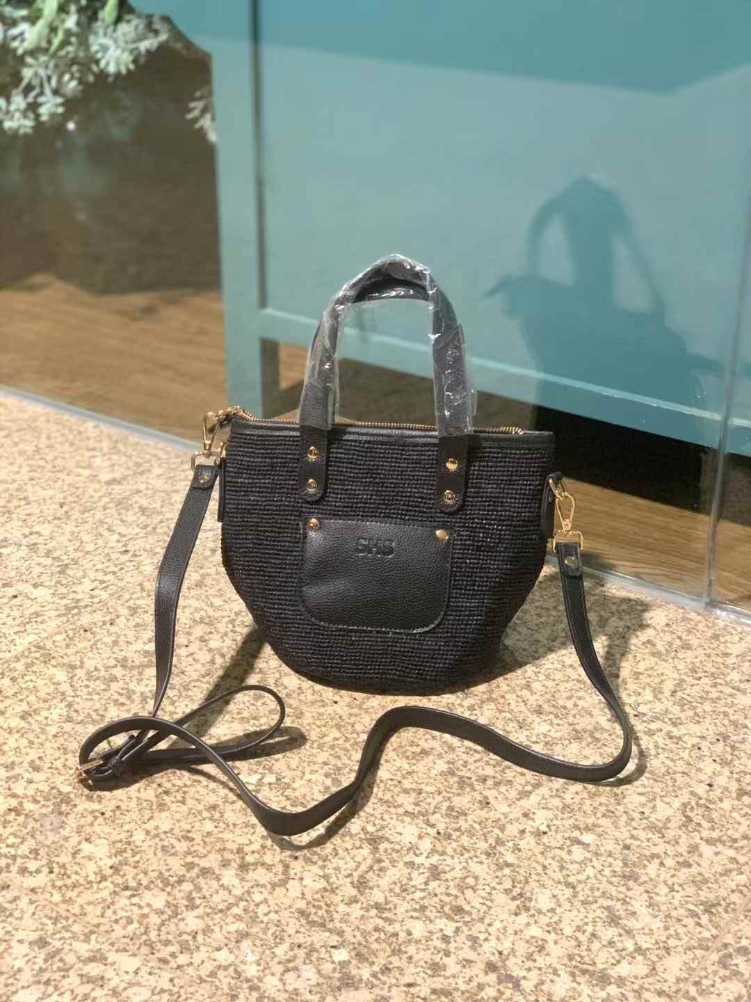 Black raffia crossbody bag